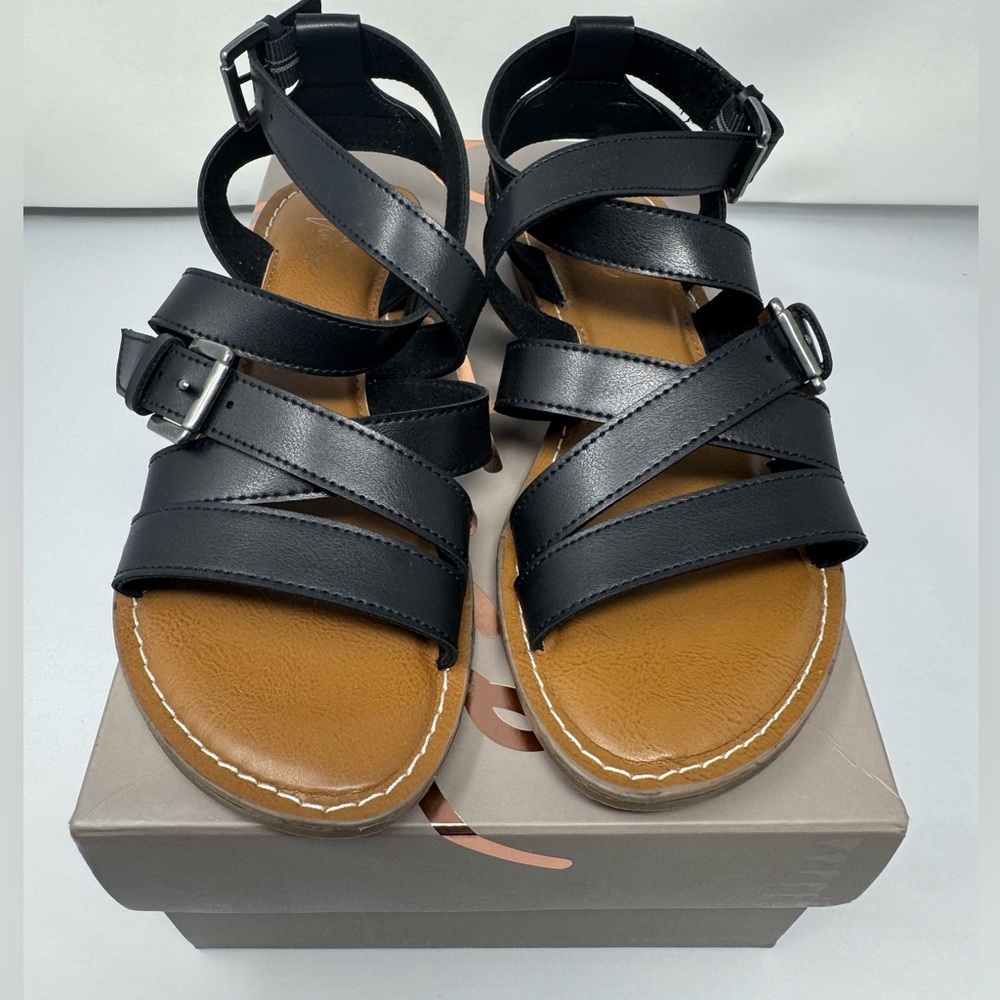 Remy Sandal, black & strappy, size 6.5 brand new in the box.